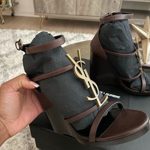 Brand new YSL wedges
Comes with box and bags.